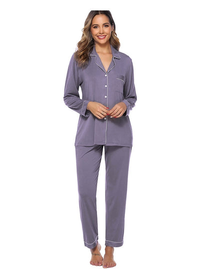 A photo of a woman in a grey bamboo pyjama set, ideal for women's sleepwear that combines comfort and eco-friendliness through the use of sustainable bamboo fibers